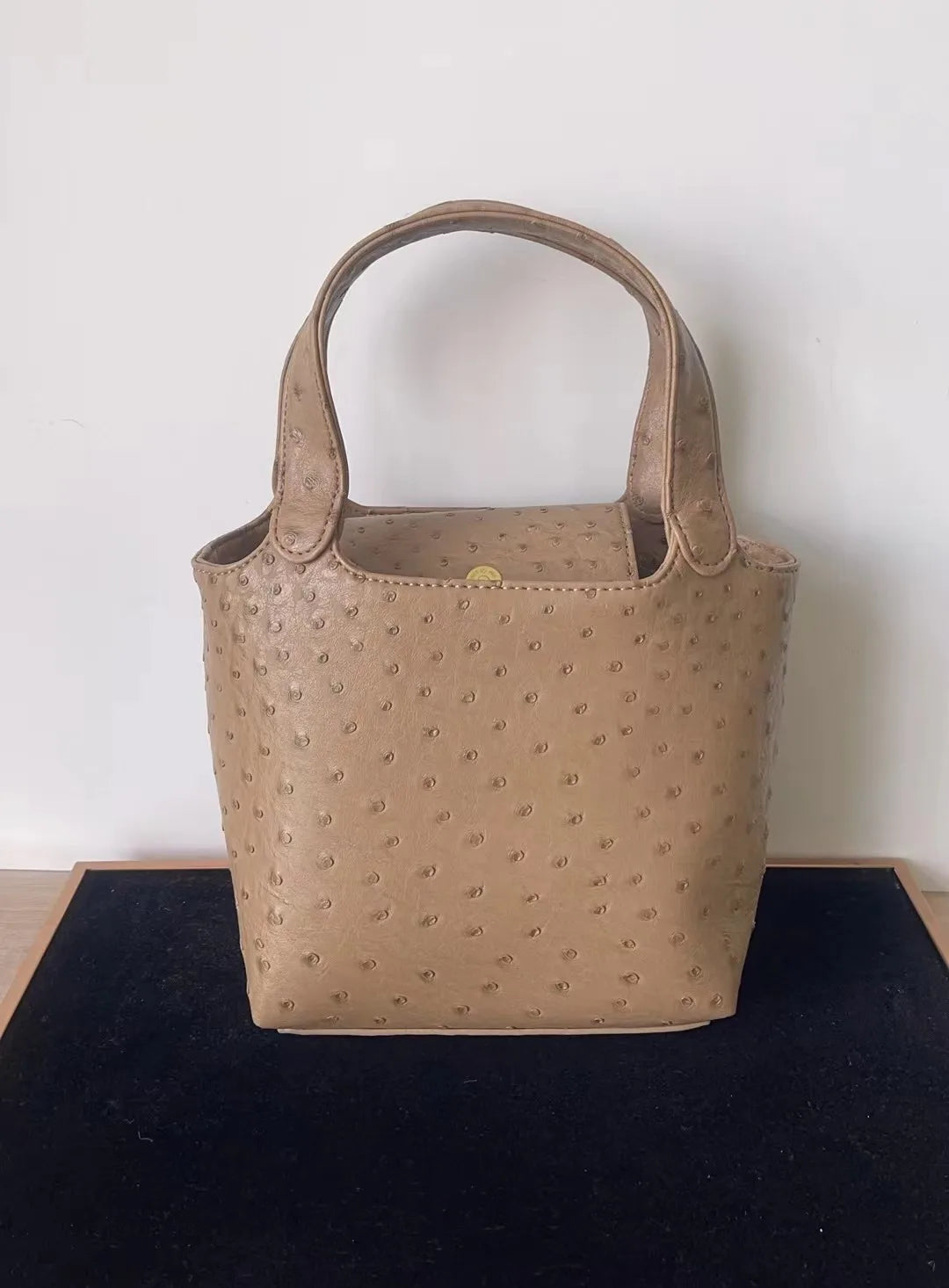 Luxury ostrich-patterned multipurpose tote. 