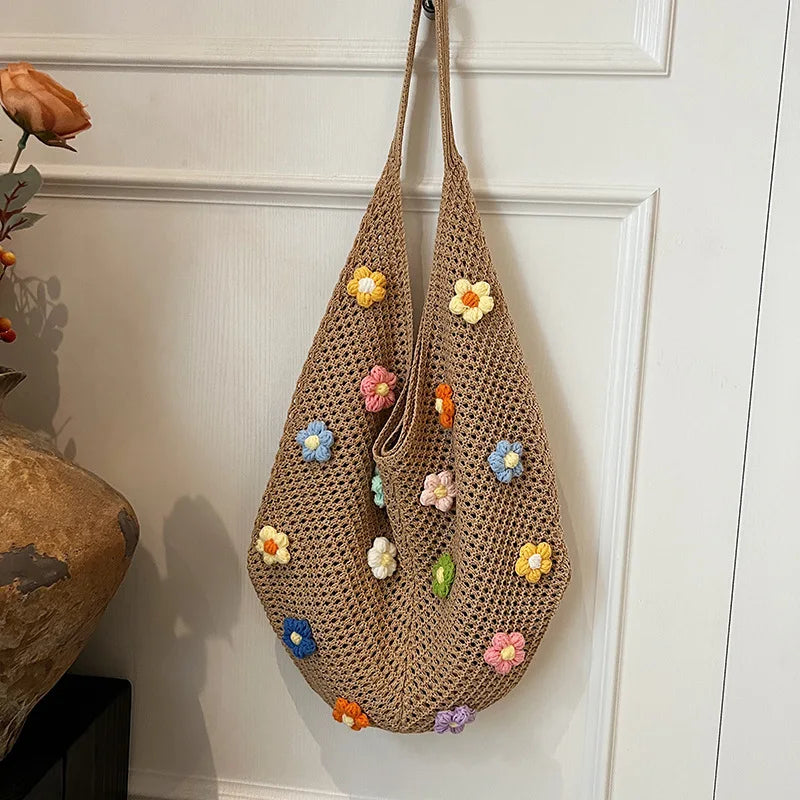 Lightweight woven shoulder bag for casual use.