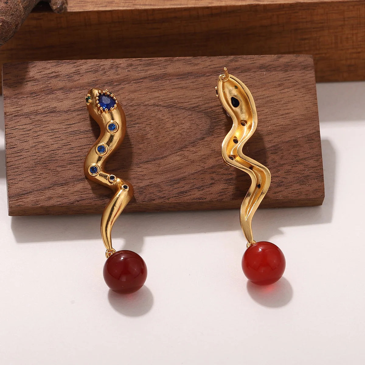 Snake Earrings with Embedded Blue & Red Stones