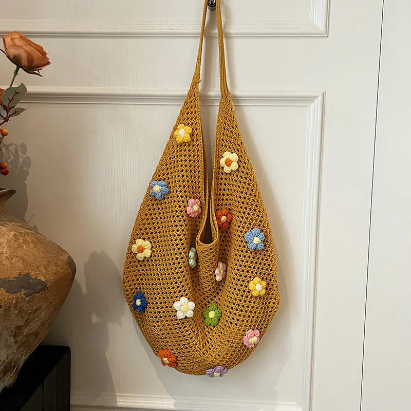 Lightweight woven shoulder bag for casual use.
