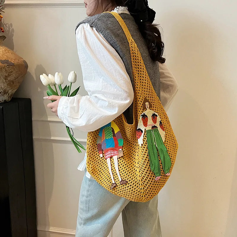 Lightweight woven shoulder bag for casual use.