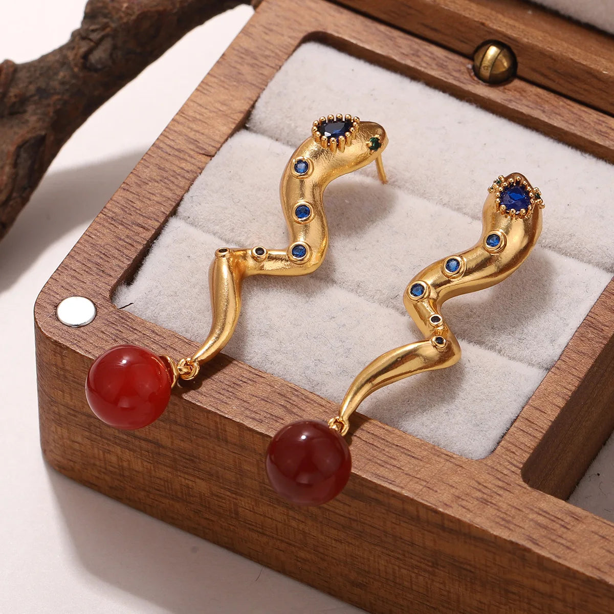 Snake Earrings with Embedded Blue & Red Stones