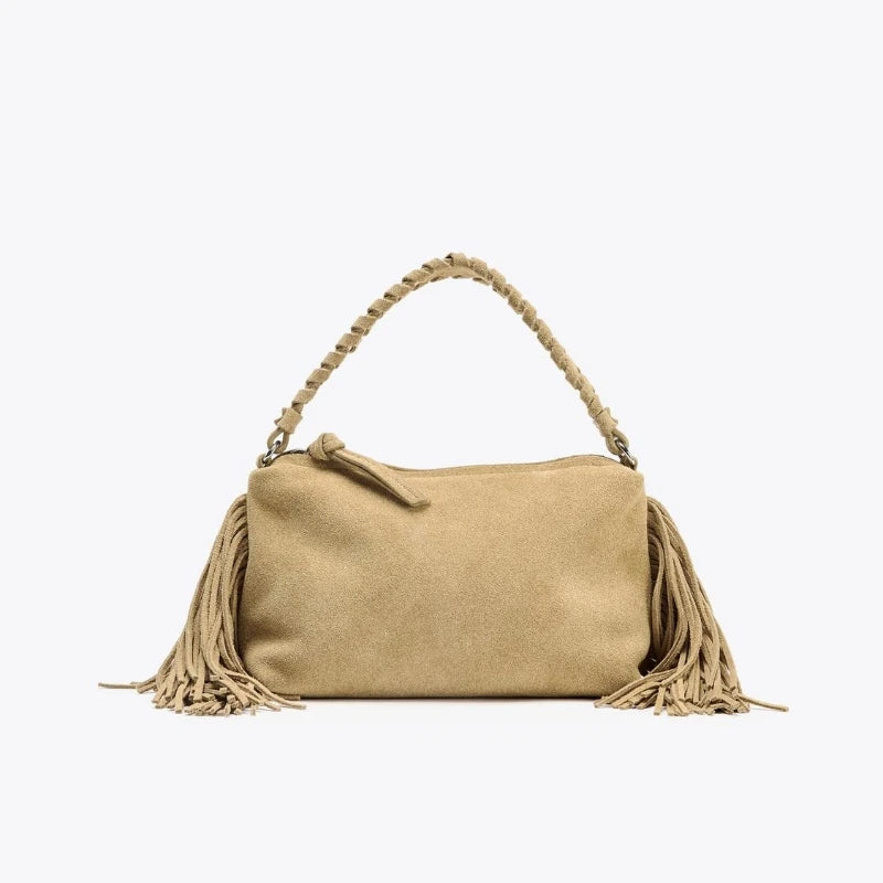 Compact crossbody bag with tassels.
