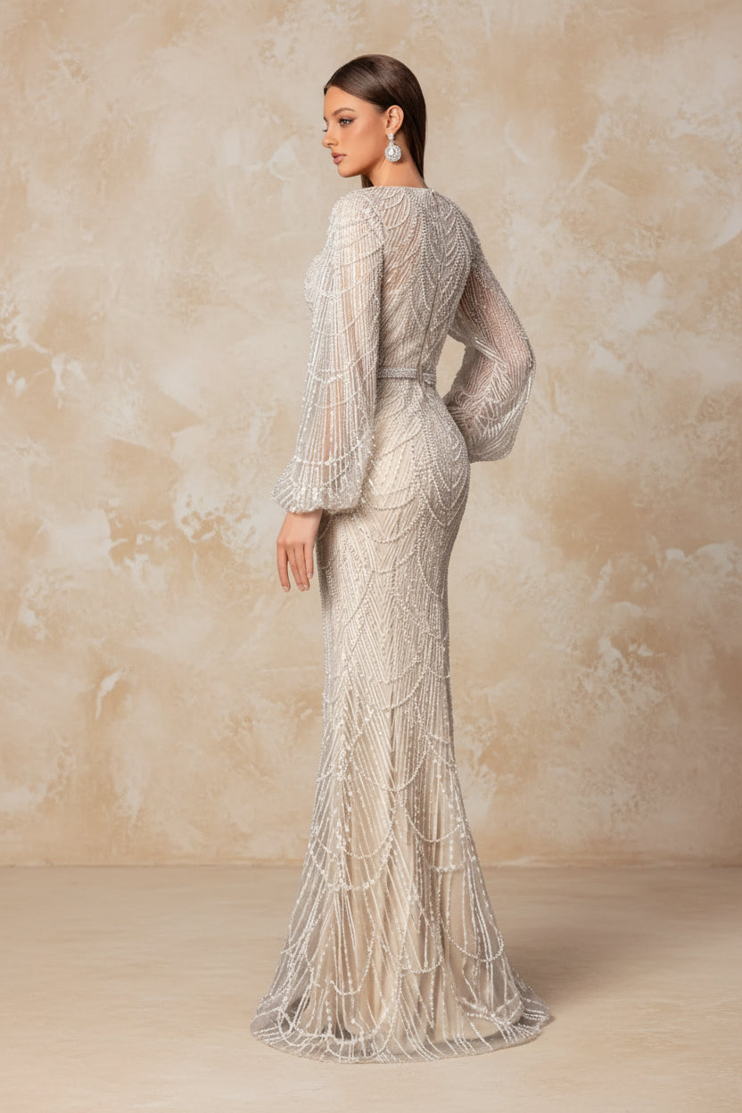Elegant and luxurious sequined mermaid long-sleeved evening dresses, adorned with sparkling crystal beads.
