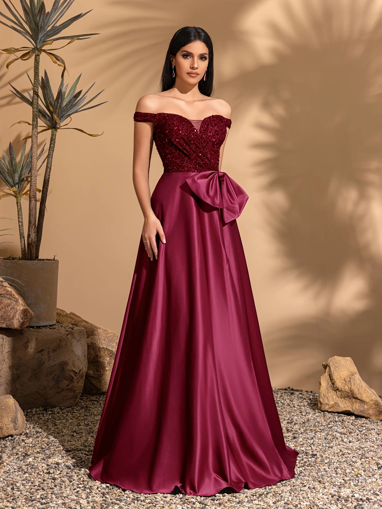 Off-the-shoulder sequined satin elegant dress with bow at waist