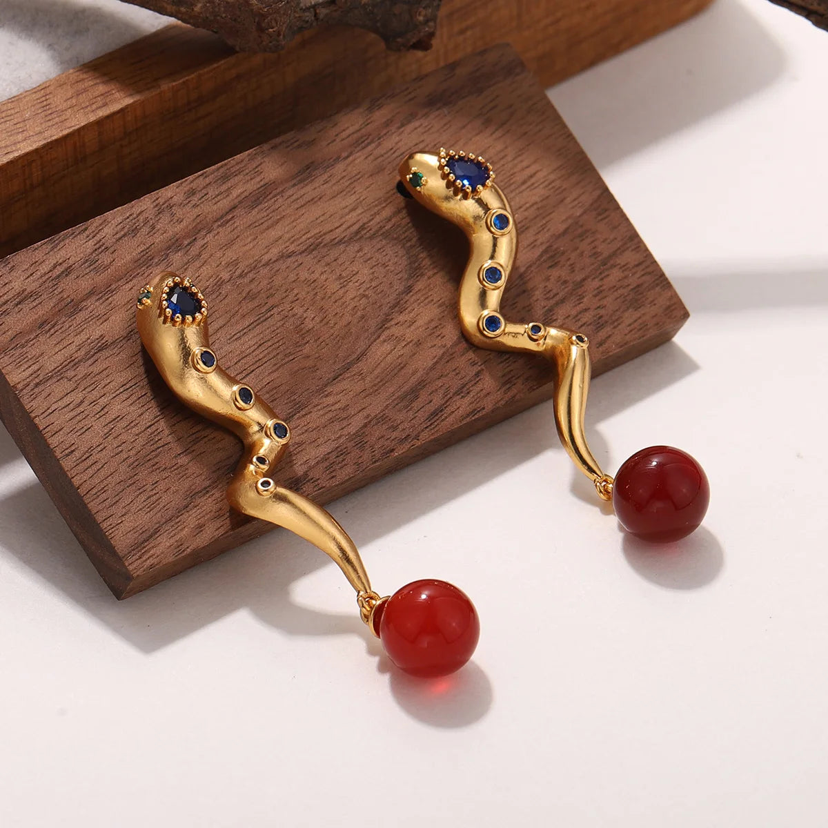 Snake Earrings with Embedded Blue & Red Stones