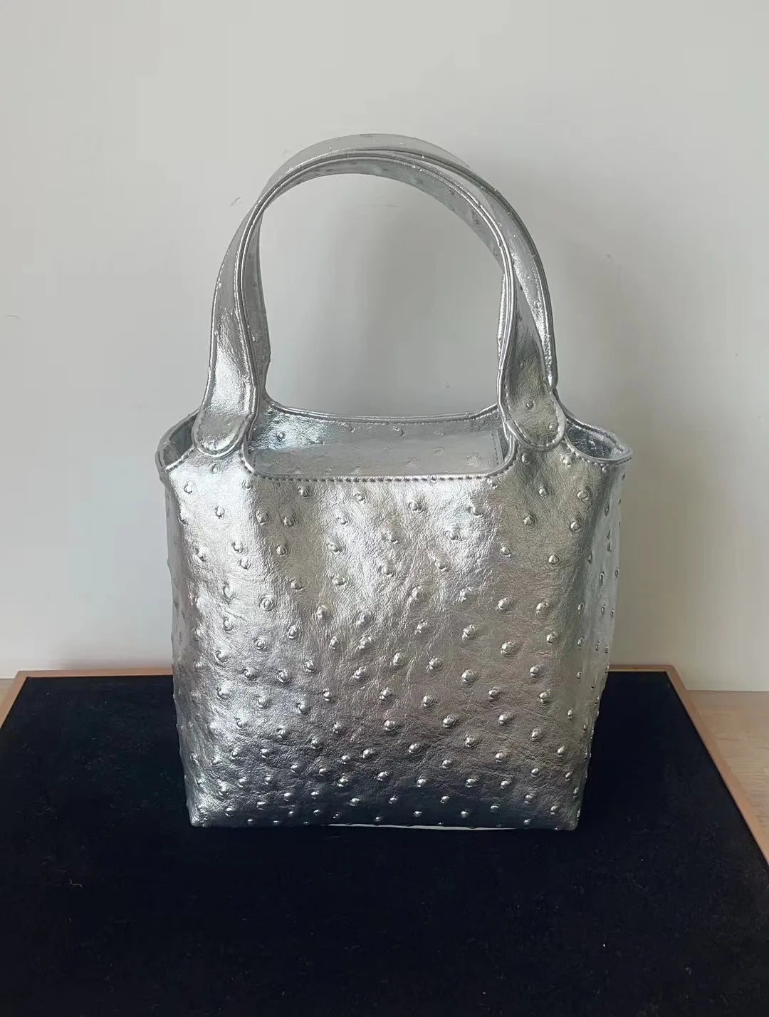 Luxury ostrich-patterned multipurpose tote. 