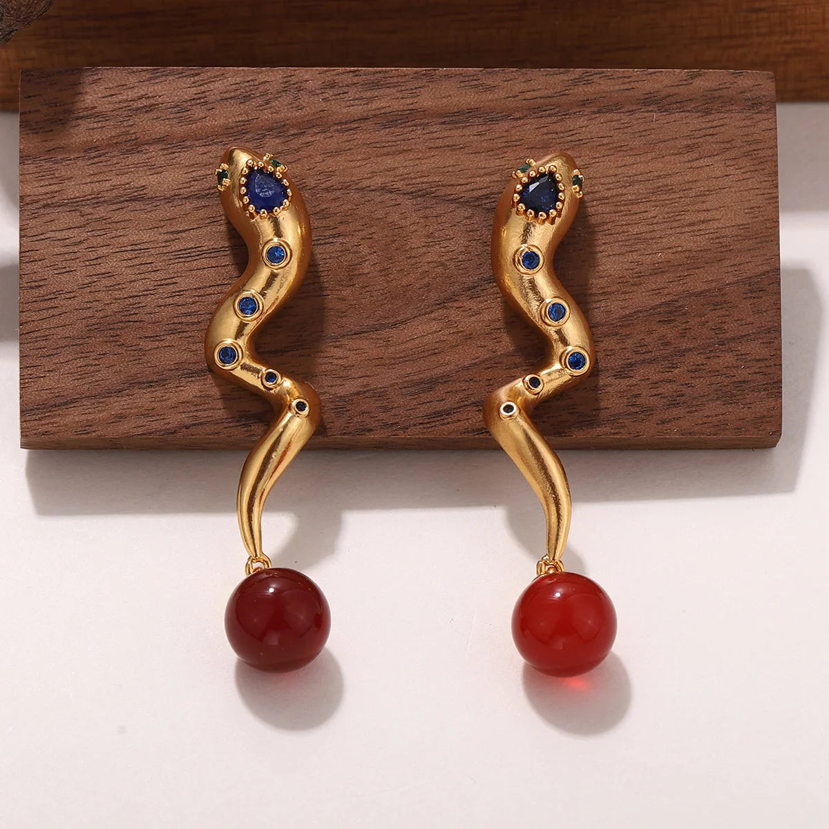 Snake Earrings with Embedded Blue & Red Stones